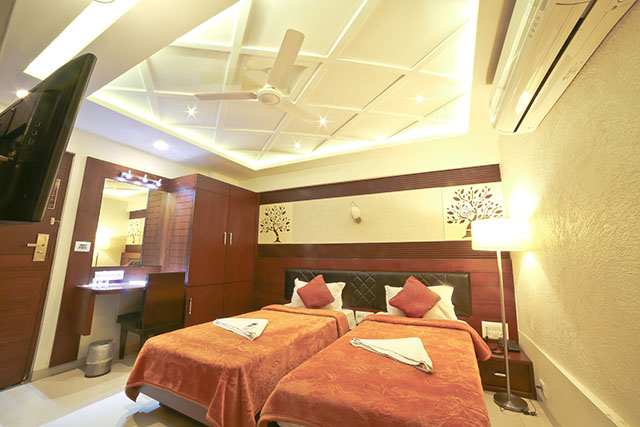 hotels  near Textile Market Surat